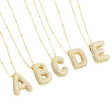 Buborékbetűs kezdeti nyaklánc